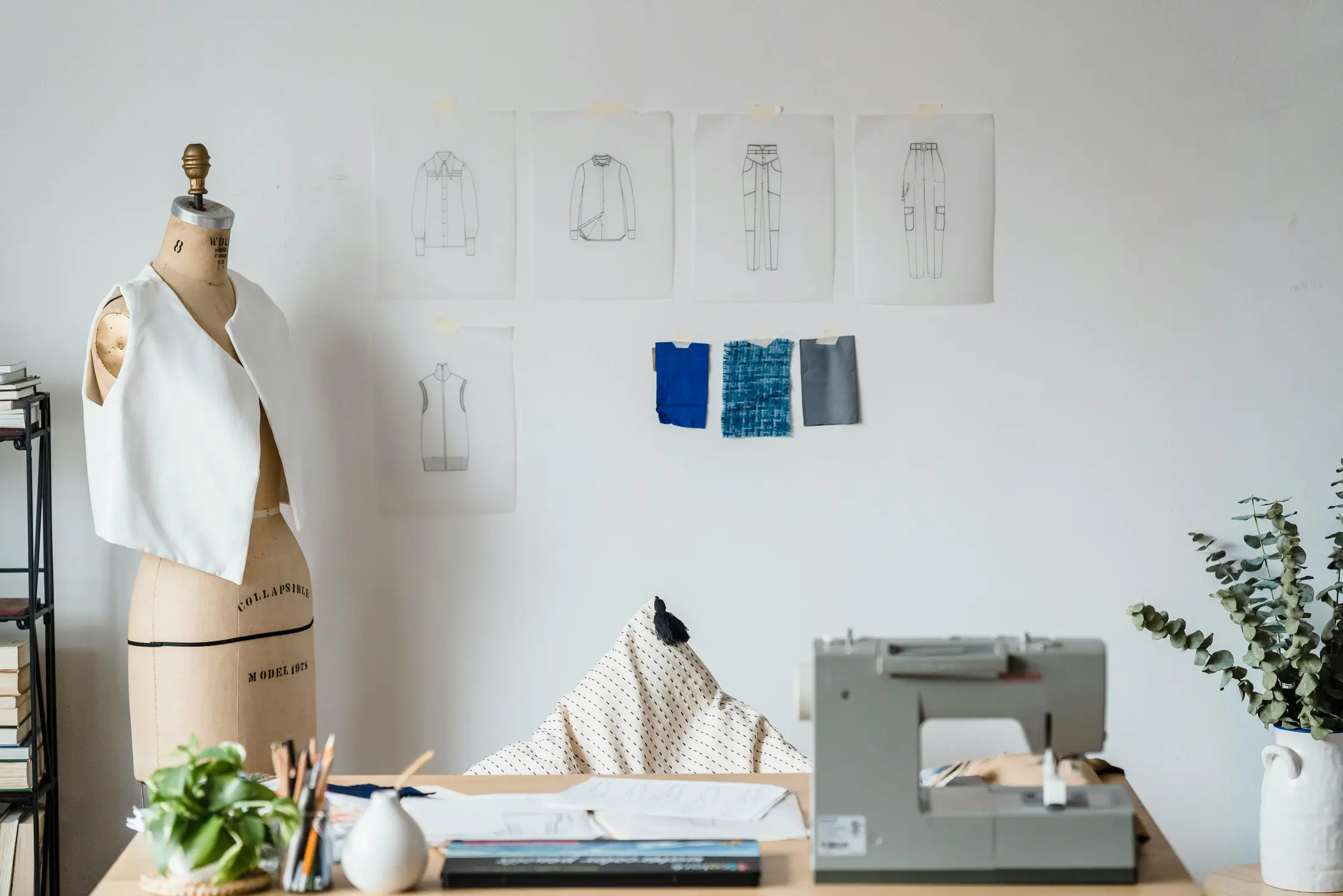 Dressmaking studio with garments and a tailor's mannequin
