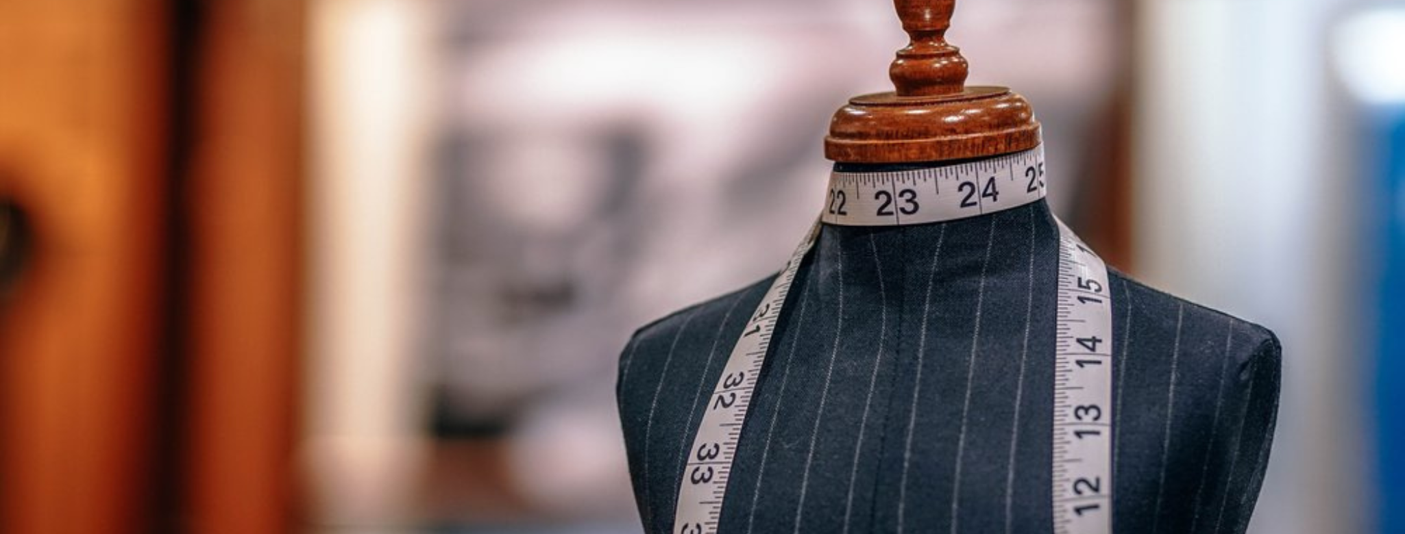 Seams and Dreams studio with garments and a tailor's mannequin