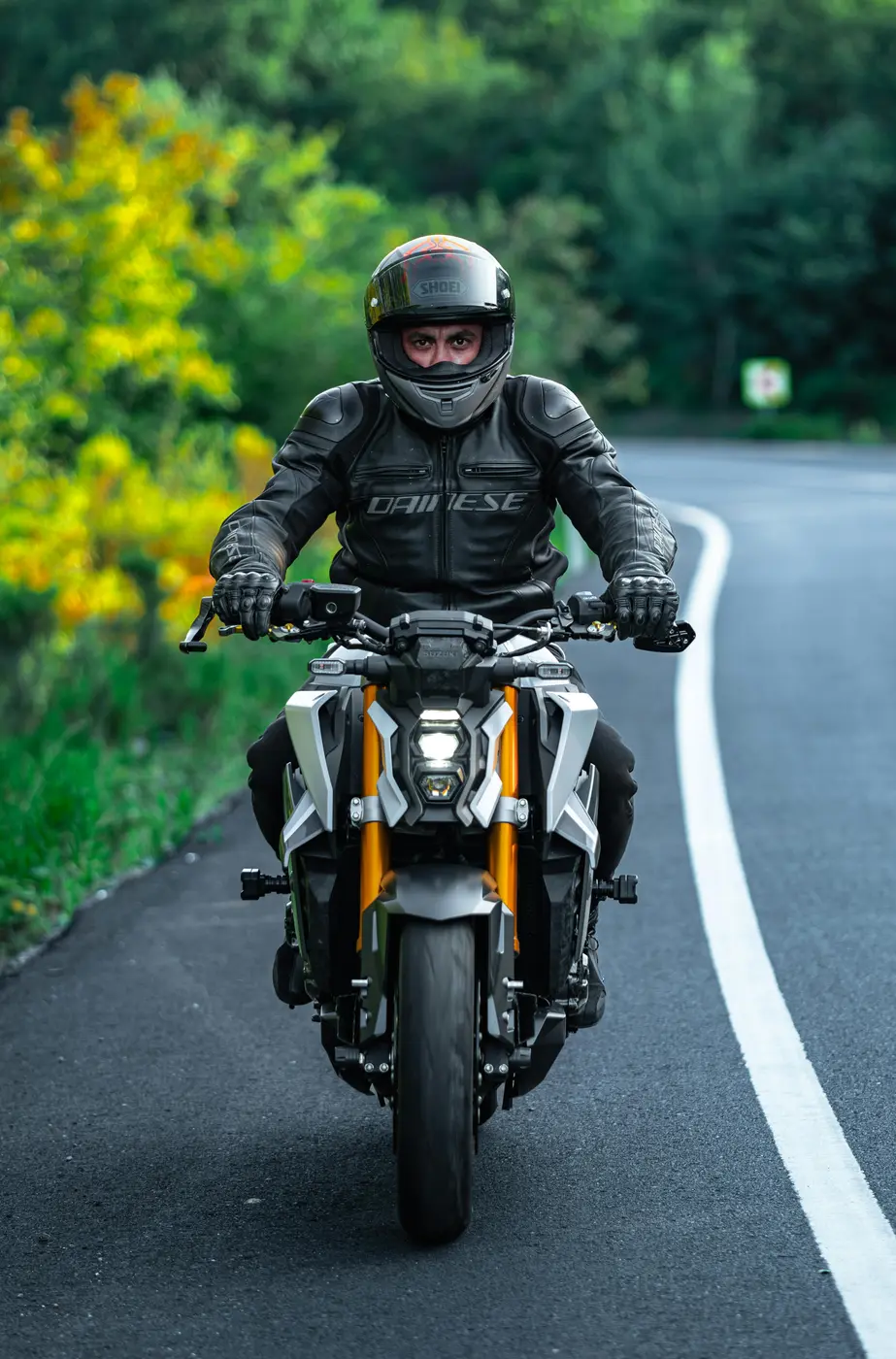 Motorcyclist wearing protective leathers