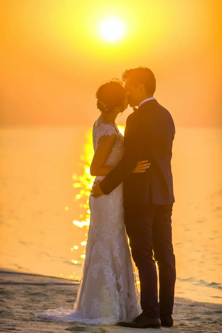 Wedding couple at sunset